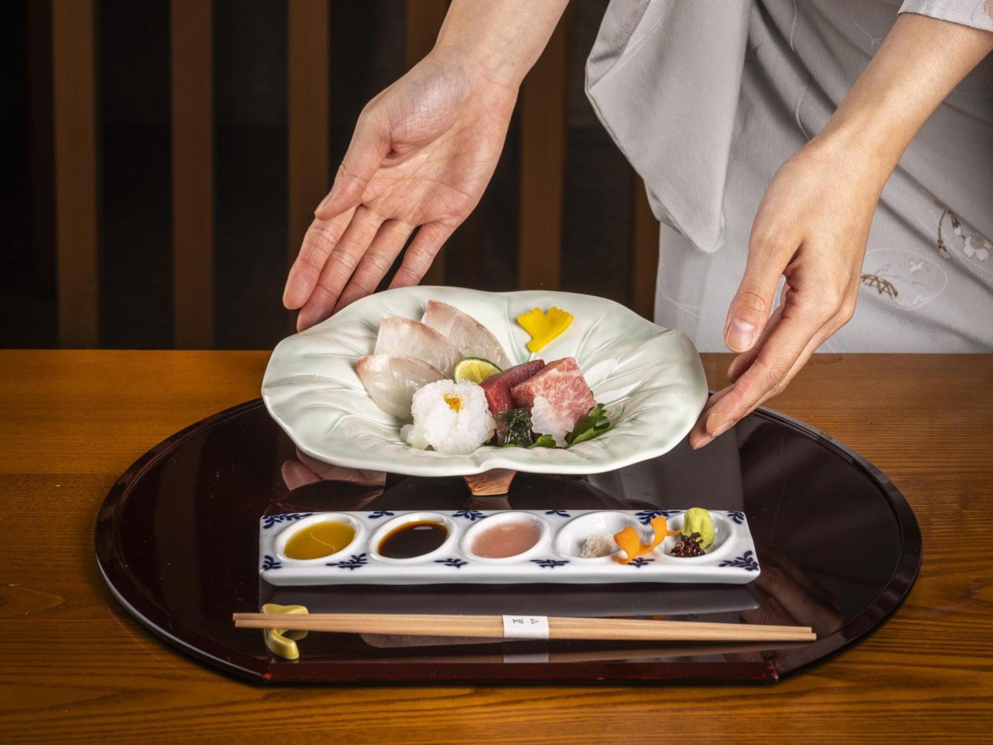 Hotel Okura Amsterdam - The Leading Hotels Of The World Exterior photo A plate of sashimi